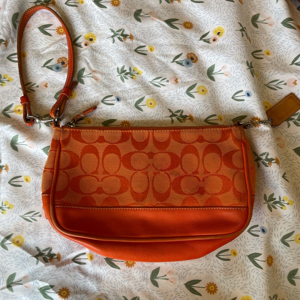 Vintage coach orange leather and fabric wristlet